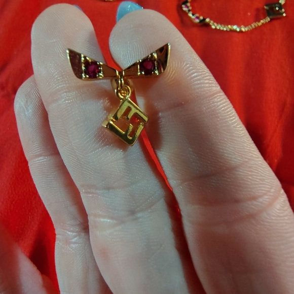 Elegant Gold Fendi Eye Earrings - Picture 1 of 3